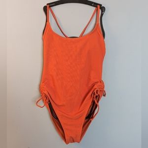 One piece orange swimsuit by Xhilaration. Size L.